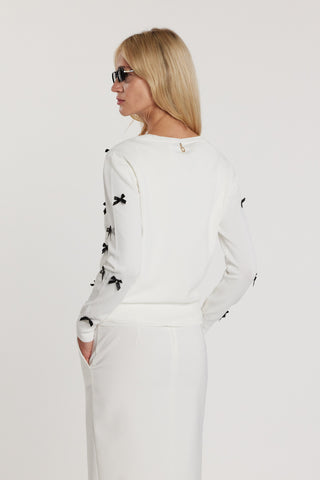 Cardigan RYDER maniche lunghe girocollo con bottoncini più fiocchi più strass