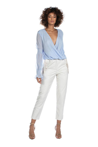 Panta LUCANIA in ecopelle vita media con tasche francesi più frange